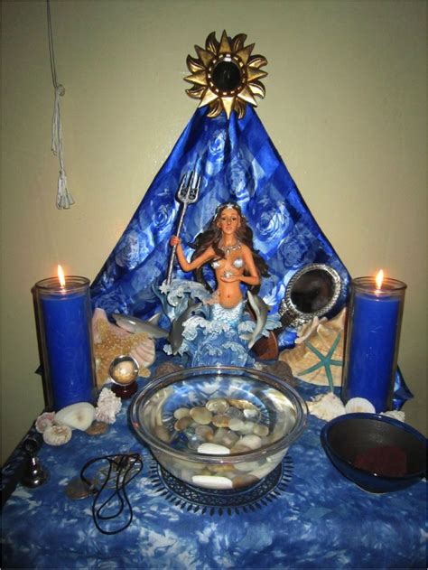 Altar for yemaya - She is symbolically associated with water, particularly the sea, embodying nurturing, healing, and protective qualities. In many traditions, including those of Yoruba, Santeria, and Candomble, Yemaya is widely accepted as the ruler of Saturday. Regarded as the Universal Mother, Yemaya carries the essence of nurturing and loving-kindness.